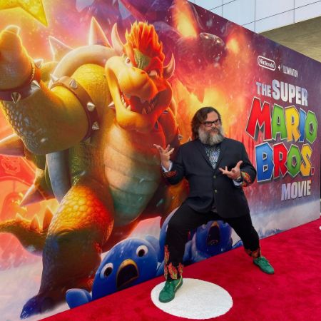 Jack Black posing at the Super Mario movie Red Carpet.